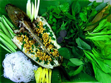 Cá lóc nướng trui ở Sài Gòn hương vị ẩm thực miền Tây